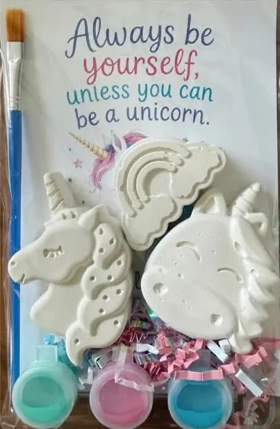 Unicorn and rainbow plaster shapes with pastel paint pots